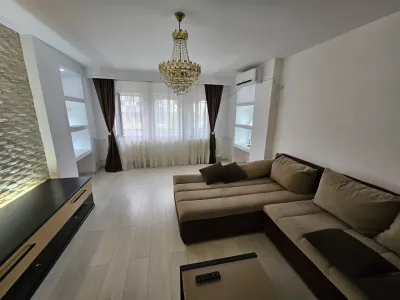 inchiriere apartament Sector 3 Bucuresti living cu canapea si tv